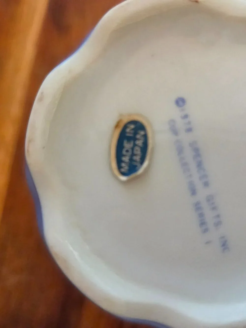 vintage teacup with praying hands blue and white toile pattern